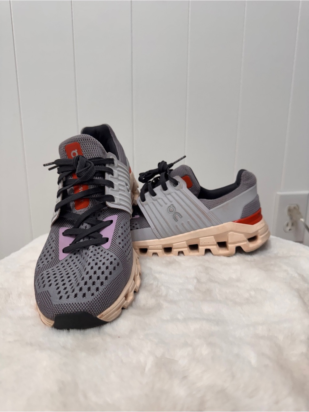 On Running Gray Sneakers with Pink and Orange Accents